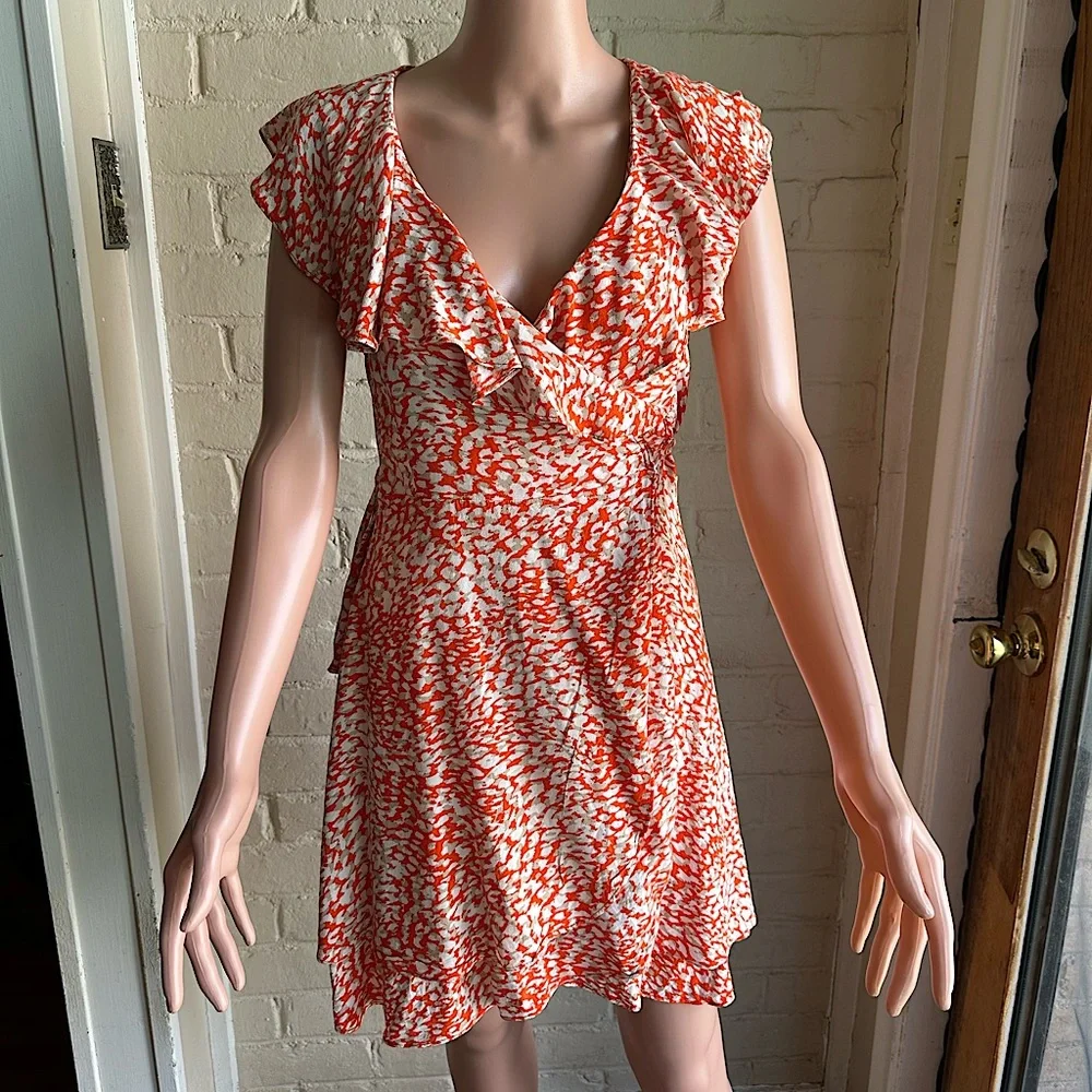 Free People size small white orange and tan animal print cute summer wrap dress